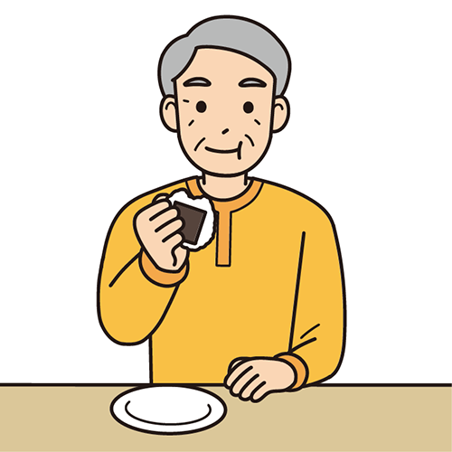 小さめのおにぎりを食べる男性