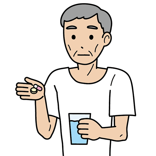 薬を飲む男性